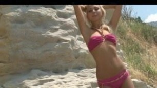 Blonde girl strips in front of the camera Part 1 of 2